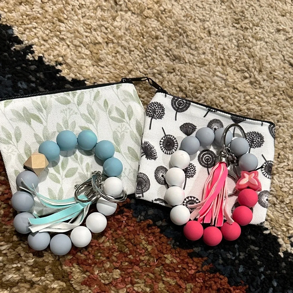 Accessory Set of 4 Includes 2 Small Zip Pouches & 2 Silicone Keychain Bracelets